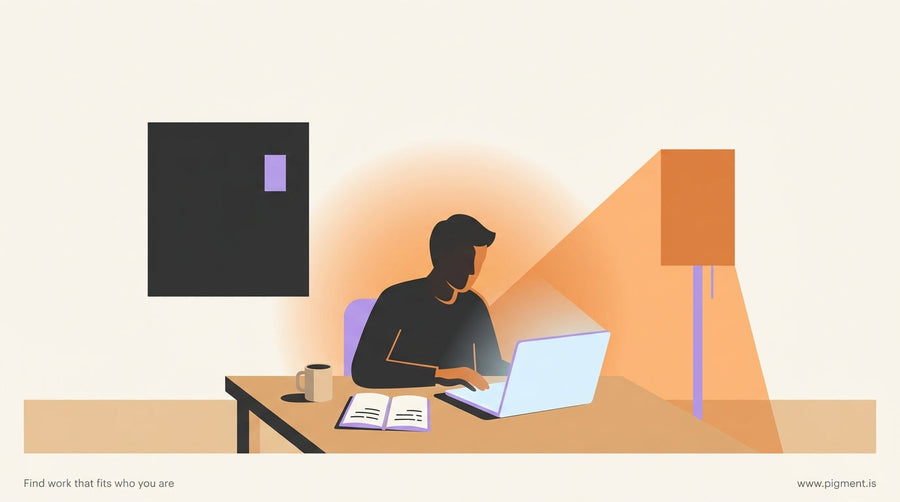 A person sits at a desk late at night with a laptop open, warm lamp light casting a golden glow, notebooks nearby with handwr