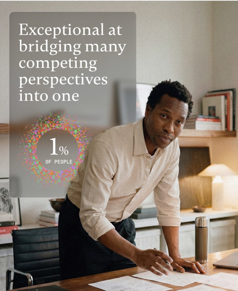 Man standing at a home desk, with a Pigment superpower card on bridging perspectives